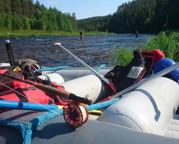 Kalastusta ja koskenlaskua-Kuusamo